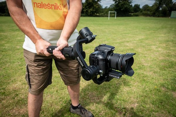 Hand-held motorised gimbal stabiliser